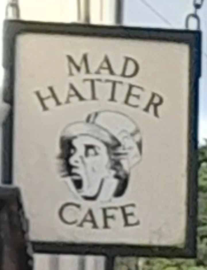 The Mad Hatter Café sign